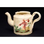An 18th Century creamware teapot and cover, circa 1780, probably Leeds,