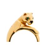 Cartier, a Cartier Panther ring, set with emerald eyes and onyx nose, 18ct gold, size K 1/2,