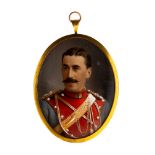 A late 19th Century oval portrait miniature of a moustached gentleman in military uniform, on ivory,