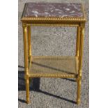 A Louis XVI design 19th Century giltwood two-tier occasional table, marble inset top,