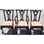 A set of fourteen early 20th Century mahogany dining chairs, of Chippendale design,