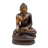A carved stone figure of Buddah,