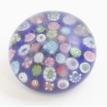 A Clichy early 20th Century millefiore glass paperweight,