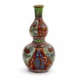 A Japanese Imari double gourd vase, enamelled panels of foliage and fauna,