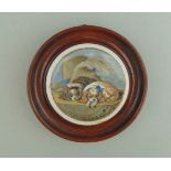 A Staffordshire Prattware polychrome pot lid mounted in a light wooden frame,