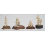 A series of four Indian ivory carvings, early 20th Century, one a lady with a basket,