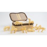 A series of eight Chinese carved ivory miniature horses, early 20th Century,
