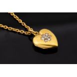 An Edwardian diamond and 15ct gold locket,