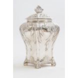 A Victorian silver caddy/pot pourri, ogee shaped on four anthemion feet,