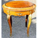 A Louis XVI style 19th Century French Kingwood and ormolu mounted occasional table, of oval form,