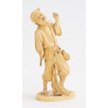 A Japanse ivory okimono of a farmer, Meiji period, 1868-1912,