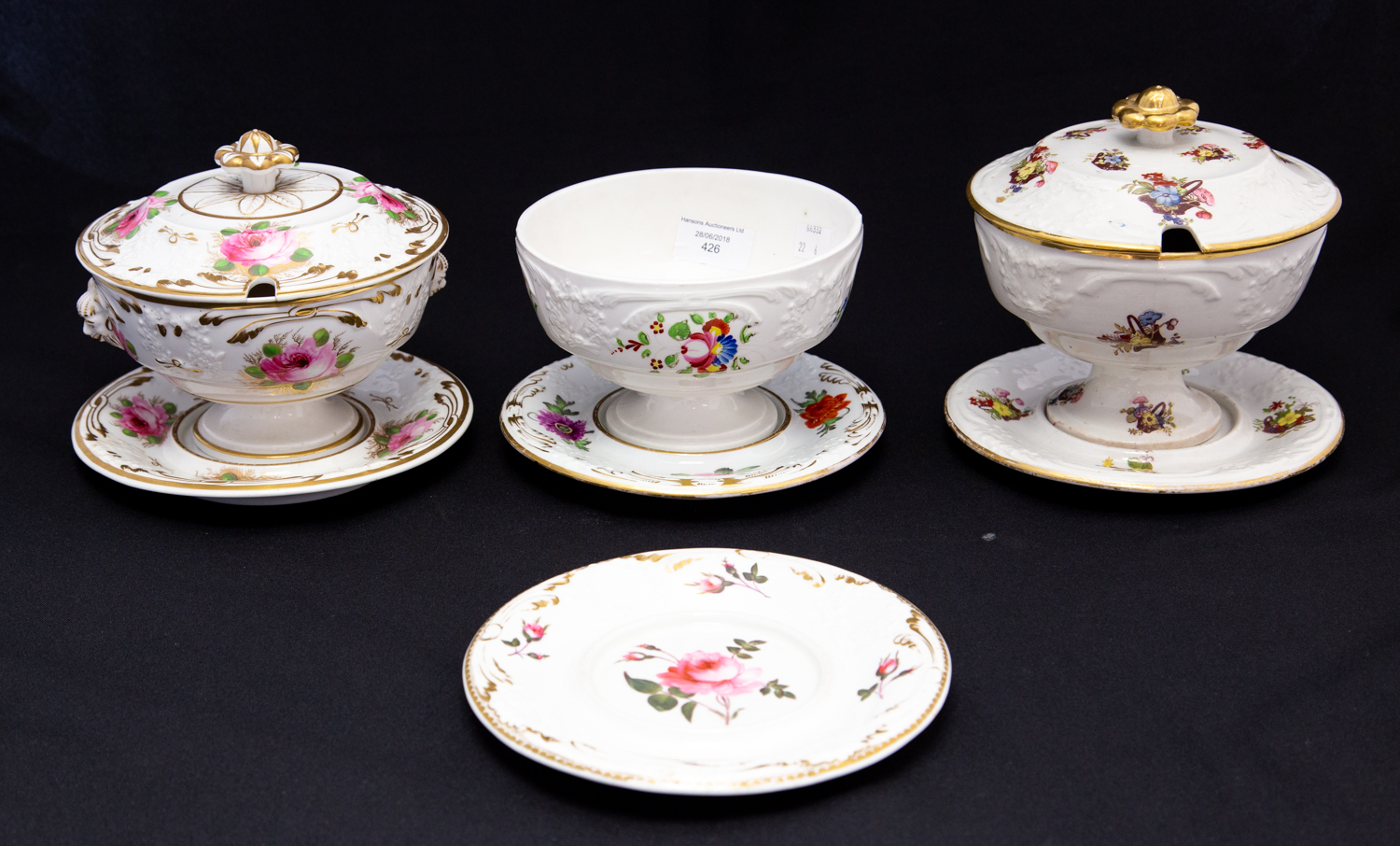 A group of three early 19th Century English Ironstone and porcelain circular sauce tureens,