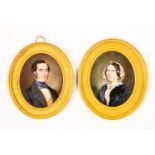 A pair of Victorian oval portrait miniatures, lady and gentleman, on ivory, 9cm by 7cm,