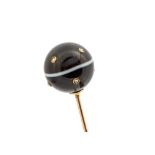 A 19th century yellow metal, agate and diamond hat pin,