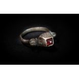 Byzantine (10th-12th century AD) A silver ring with plain band,