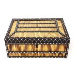 A 19th Century Middle Eastern porcupine quillwork casket, inset bone dot decoration ,