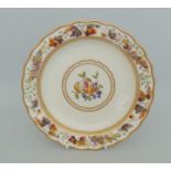 A Derby dessert plate with a fluted rim, painted with flowers and leaves within gilt bands,