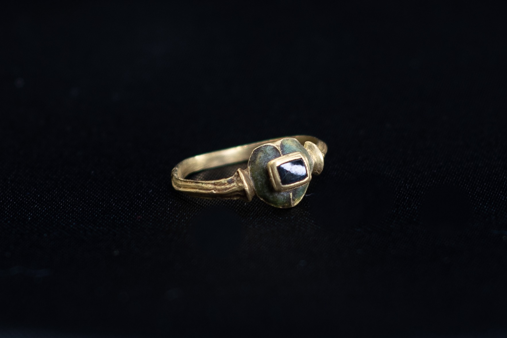 Post Medieval (16th-18th century AD) Gold ring with plain band widening at the shoulders to form