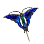 Charles Horner - a silver and enamel hat pin, in the form of a butterfly, blue and green tones,