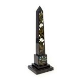 A 19th Century Ashford marble desk obelisk, inset with vine flowers and forget-me-nots,