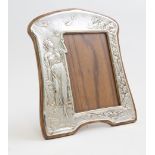 A silver Art Nouveau photograph frame made by Henry Matthews with hallmarks for Birmingham 1907