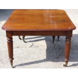 A Victorian mahogany extending dining table, fitted with four removable leaves, 74cm high,