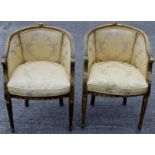 A pair of 19th Century Louis XVI style giltwood bergere chairs,