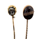 An early 19th century mourning stick pin,