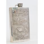 An Asian silver large hip flask, the front chased with elephant,