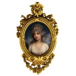 A George III oval portrait miniature of a beautiful young lady in a white dress, on ivory,