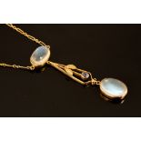 A Belle Epoque moonstone and sapphire drop necklet, circa 1895,