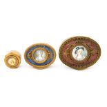 Three late 19th Century French gilt metal jewel/trinket boxes,