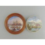Two Staffordshire Prattware polychrome pot lids, one mounted in a light wooden frame,