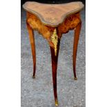 A 19th Century French rosewood and kingwood ormolu mounted corner ladies toilet table,