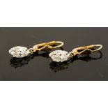 A pair of 18ct diamond and 18ct gold pendant earrings,