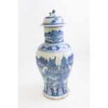 A Chinese blue and white jar and cover, Kangxi style, lakeside temple scene with figures,