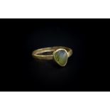 Medieval (13th Century AD) Gold ring with flat hoop with series of segmented panels;