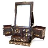 A 19th Century Oriental hardwood dressing case, mother of pearl inlaid to form foliage,