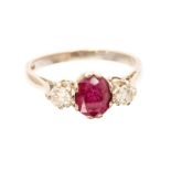 A ruby and diamond three stone 18ct white gold ring, ruby approx 1.