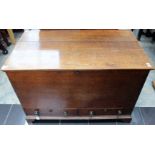 A George III oak mule chest, carcase construction, the plank top opening to reveal storage area,