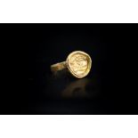 East Greek (5th-4th century BC) Gold ring with plain flat band;