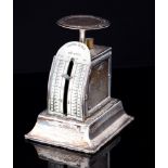 A set of Edwardian novelty Postal Scales, on plinth base with domed ivorine dial, Levi & Salaman,