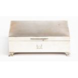 An Elizabeth II silver cigar box, engine turned lid, on bracket feet,