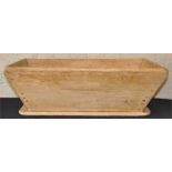 A vintage French pine dough bin, of typical form, (lacking legs), 78 cm wide x 44 cm deep