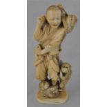 A Japanese Meiji period carved marine ivory okimono, of a man and monkeys, (some damage), height