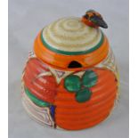 Clarice Cliff for Newport Pottery, an Orange Melon beehive honey pot, Fantasque Bizarre marks, 9cm