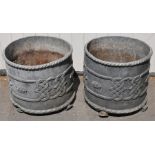 A pair of 20th century lead garden planters, with gadrooned rim, the sides with intertwined celtic