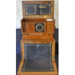 A Parkins & Gotto combination burr walnut stationery box with inbuilt writing slope, early 20th