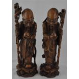 ***REOFFER IN DERBY AUGUST SALE £40/£60***  A pair of Japanese carved wood figures of sages, wearing