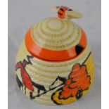 Clarice Cliff for Newport Pottery, a small House and Bridge beehive honey pot, Fantasque Bizarre